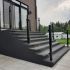 Balcon extérieur rénové avec un crépi acrylique durable et facile à entretenir.