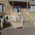 Finition acrylique sur muret en béton coulé
